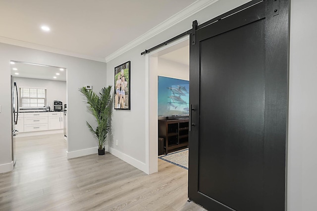 2388 SW Congress Blvd, Boynton Beach, FL 33426 - hallway featuring light wood-type flooring, ornamental molding, a barn door, baseboards, and recessed lighting