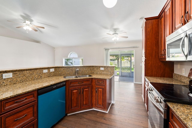 1552 SW Neponset Rd, Port Saint Lucie, FL 34953 - kitchen with appliances with stainless steel finishes, a sink, ceiling fan, dark wood-type flooring, and backsplash