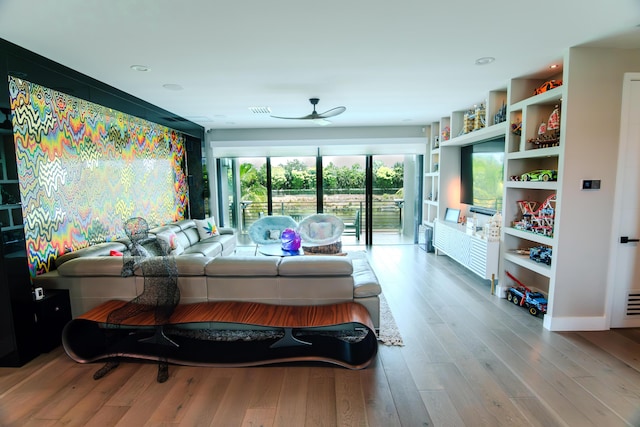 8305 Fishhawk Falls Ct, Boca Raton, FL 33496 - living area featuring a ceiling fan and wood finished floors