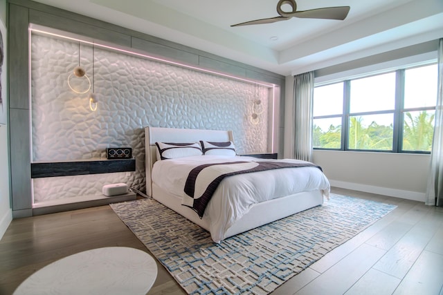 8305 Fishhawk Falls Ct, Boca Raton, FL 33496 - bedroom featuring baseboards, wood finished floors, and a ceiling fan