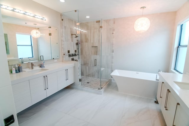 8305 Fishhawk Falls Ct, Boca Raton, FL 33496 - full bath featuring vanity, a stall shower, a freestanding bath, plenty of natural light, and recessed lighting
