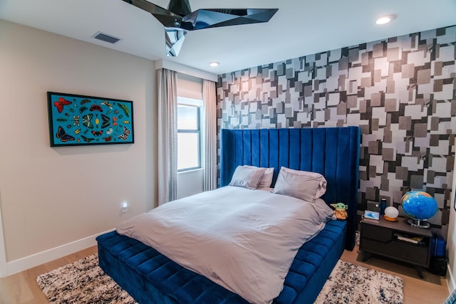 8305 Fishhawk Falls Ct, Boca Raton, FL 33496 - bedroom featuring an accent wall, baseboards, recessed lighting, wood finished floors, and wallpapered walls