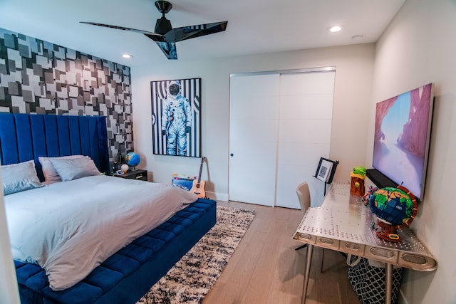 8305 Fishhawk Falls Ct, Boca Raton, FL 33496 - bedroom with wood finished floors, ceiling fan, recessed lighting, baseboards, and a closet