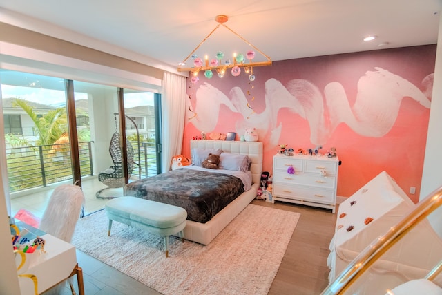 8305 Fishhawk Falls Ct, Boca Raton, FL 33496 - bedroom with access to exterior, wood finished floors, and recessed lighting