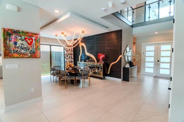 8305 Fishhawk Falls Ct, Boca Raton, FL 33496 - dining area with french doors, a chandelier, baseboards, recessed lighting, and tile patterned floors