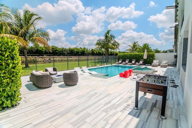 8305 Fishhawk Falls Ct, Boca Raton, FL 33496 - view of swimming pool with a patio area, a fenced backyard, and a pool with connected hot tub