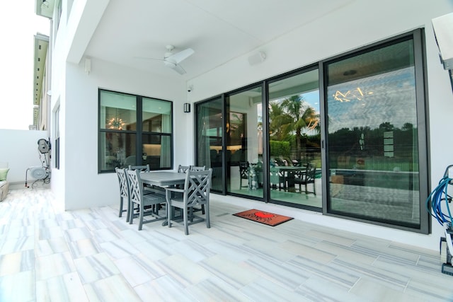 8305 Fishhawk Falls Ct, Boca Raton, FL 33496 - wooden deck with a ceiling fan, outdoor dining space, and a patio area