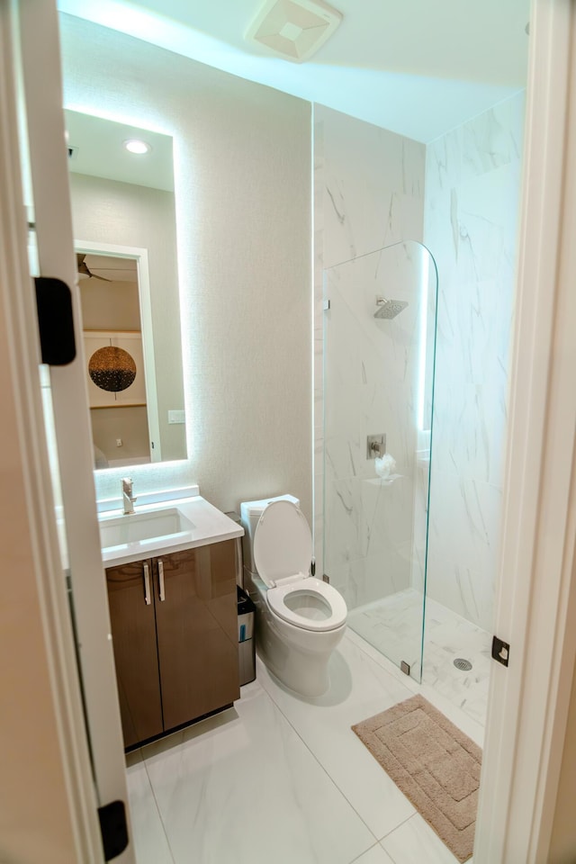 8305 Fishhawk Falls Ct, Boca Raton, FL 33496 - full bathroom with toilet, vanity, and a marble finish shower