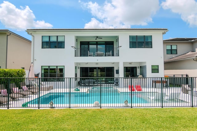 8305 Fishhawk Falls Ct, Boca Raton, FL 33496 - rear view of property featuring a balcony, stucco siding, and a patio