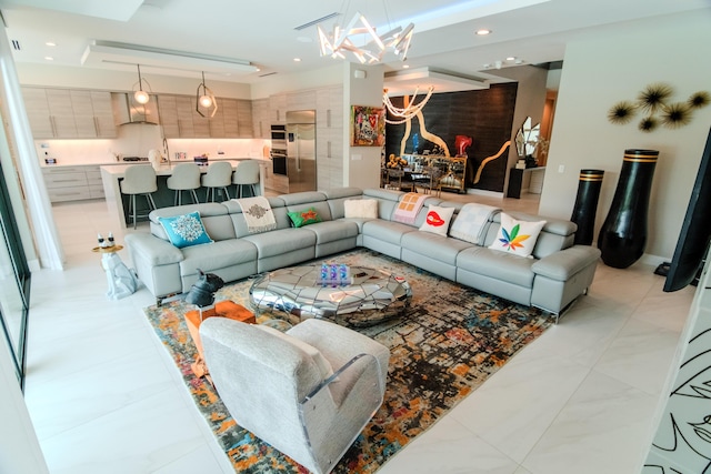 8305 Fishhawk Falls Ct, Boca Raton, FL 33496 - living room featuring a chandelier and recessed lighting