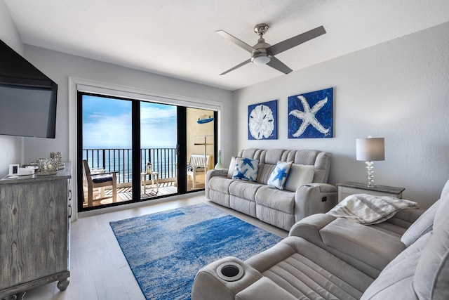 7430 S Ocean Dr Unit 518, Jensen Beach, FL 34957 - living room with ceiling fan and wood finished floors