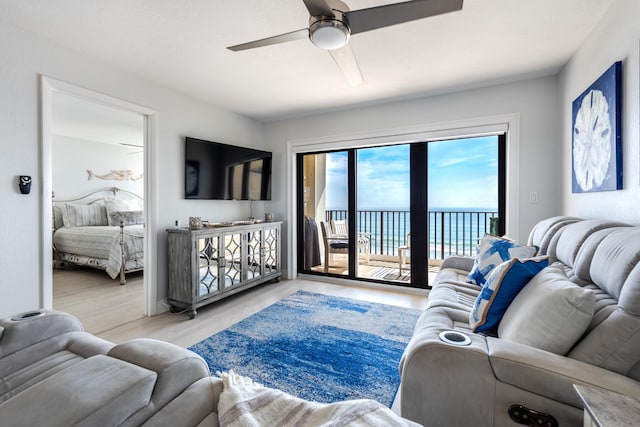 7430 S Ocean Dr Unit 518, Jensen Beach, FL 34957 - living room featuring a ceiling fan and wood finished floors