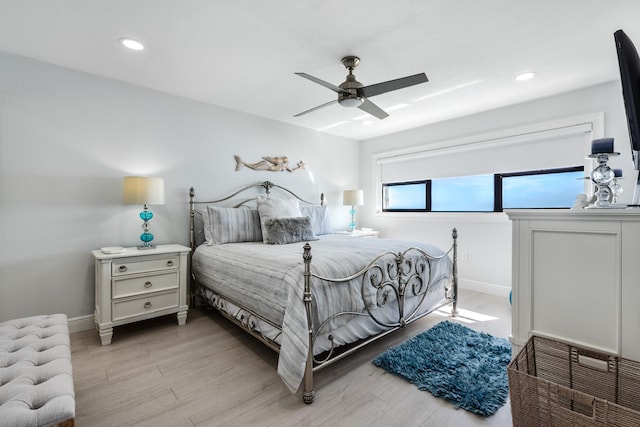 7430 S Ocean Dr Unit 518, Jensen Beach, FL 34957 - bedroom featuring light wood-style floors, recessed lighting, baseboards, and ceiling fan