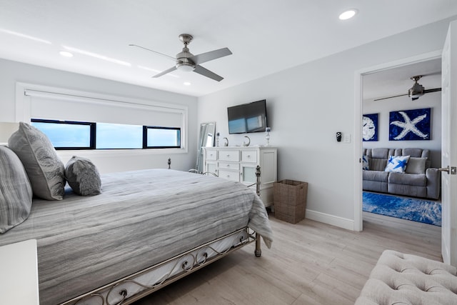 7430 S Ocean Dr Unit 518, Jensen Beach, FL 34957 - bedroom with light wood-style floors, baseboards, recessed lighting, and ceiling fan