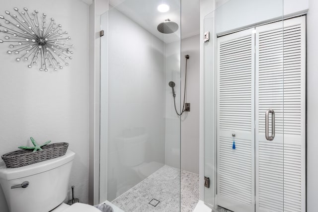 7430 S Ocean Dr Unit 518, Jensen Beach, FL 34957 - bathroom featuring a shower stall and toilet