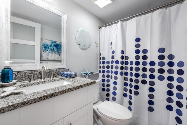 7430 S Ocean Dr Unit 518, Jensen Beach, FL 34957 - bathroom with vanity, toilet, and curtained shower