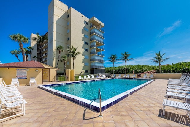 7430 S Ocean Dr Unit 518, Jensen Beach, FL 34957 - community pool featuring a patio