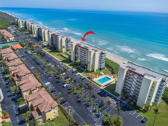 7430 S Ocean Dr Unit 518, Jensen Beach, FL 34957 - drone / aerial view of a nearby body of water and a pool area