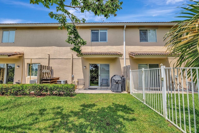 5285 SE Jennings Ln, Stuart, FL 34997 - back of house with stucco siding and central AC unit