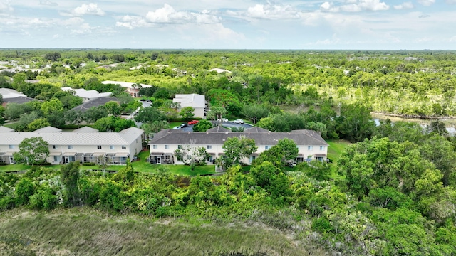 5285 SE Jennings Ln, Stuart, FL 34997 - aerial perspective of suburban area featuring a heavily wooded area