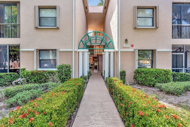 4101 Coral Tree Cir Unit 116, Coconut Creek, FL 33073 - view of exterior entry featuring stucco siding
