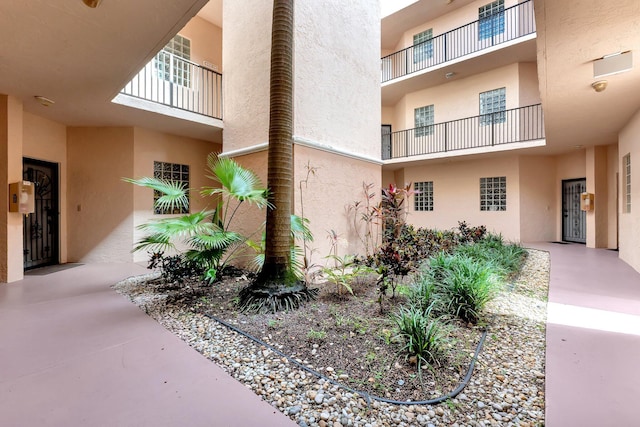 4101 Coral Tree Cir Unit 116, Coconut Creek, FL 33073 - view of home's exterior featuring stucco siding