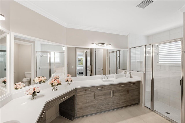 11688 SW Brighton Falls Dr, Port Saint Lucie, FL 34987 - bathroom featuring double vanity, toilet, connected bathroom, a stall shower, and crown molding