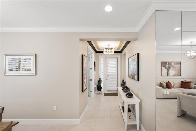 11688 SW Brighton Falls Dr, Port Saint Lucie, FL 34987 - foyer featuring ornamental molding, baseboards, and light tile patterned flooring