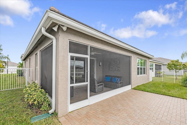 11688 SW Brighton Falls Dr, Port Saint Lucie, FL 34987 - view of patio / terrace with a sunroom