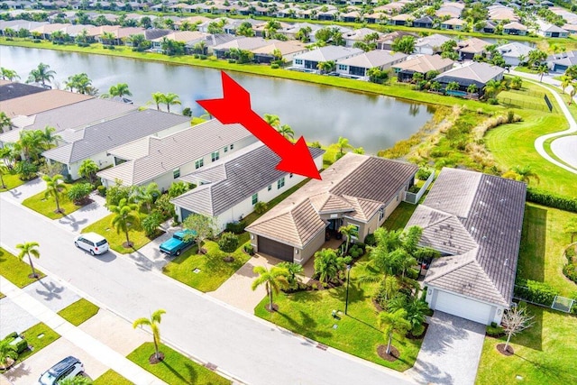 11688 SW Brighton Falls Dr, Port Saint Lucie, FL 34987 - aerial view of residential area with a large body of water