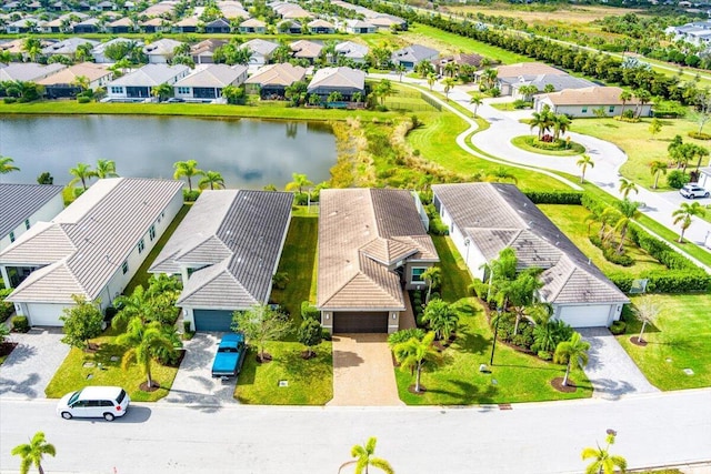 11688 SW Brighton Falls Dr, Port Saint Lucie, FL 34987 - aerial view of residential area with a large body of water
