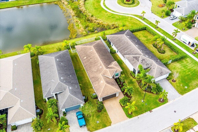 11688 SW Brighton Falls Dr, Port Saint Lucie, FL 34987 - aerial perspective of suburban area with a large body of water
