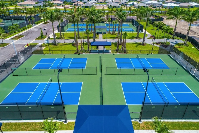 11688 SW Brighton Falls Dr, Port Saint Lucie, FL 34987 - view of tennis court with a residential view