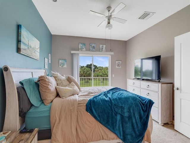 2536 Creekside Dr, Fort Pierce, FL 34981 - bedroom with access to exterior, light carpet, and ceiling fan