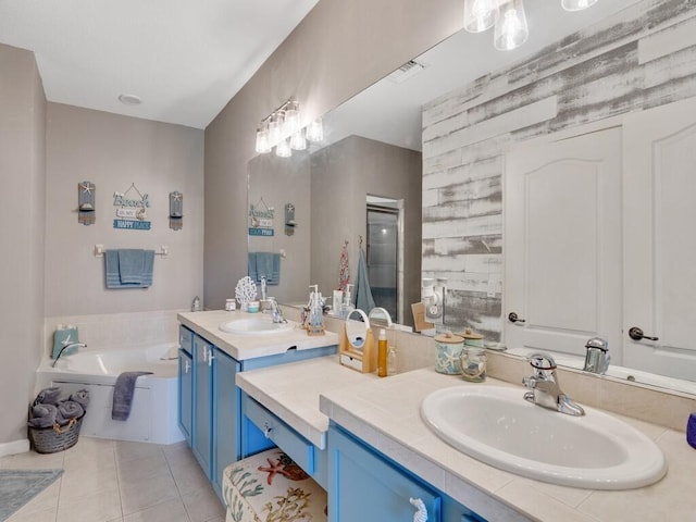 2536 Creekside Dr, Fort Pierce, FL 34981 - full bath featuring double vanity, a bath, tile patterned floors, and a stall shower