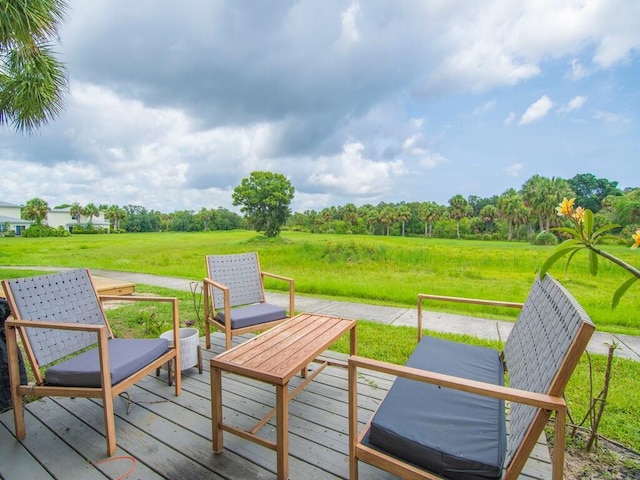 2536 Creekside Dr, Fort Pierce, FL 34981 - wooden terrace featuring a lawn