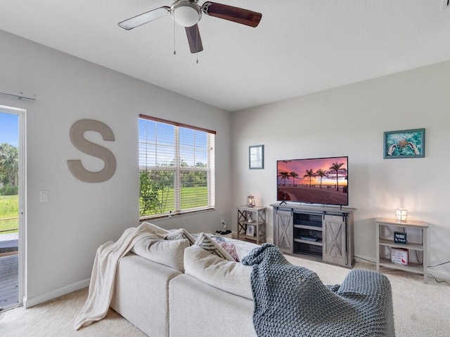 2536 Creekside Dr, Fort Pierce, FL 34981 - carpeted living area featuring a ceiling fan and baseboards