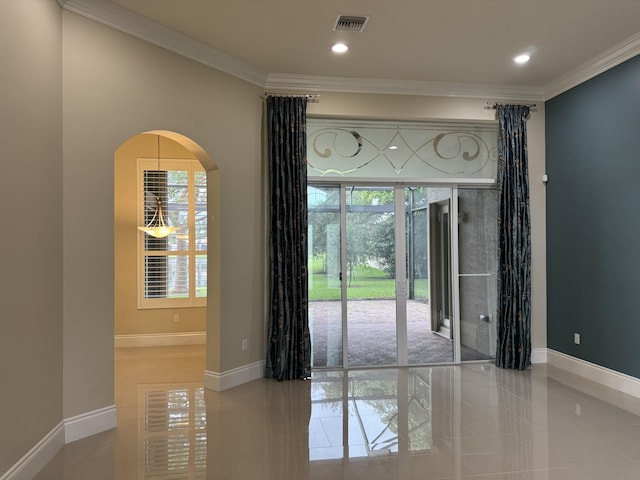 10469 Whitewind Cir, Boynton Beach, FL 33473 - tiled spare room featuring arched walkways, ornamental molding, baseboards, and recessed lighting