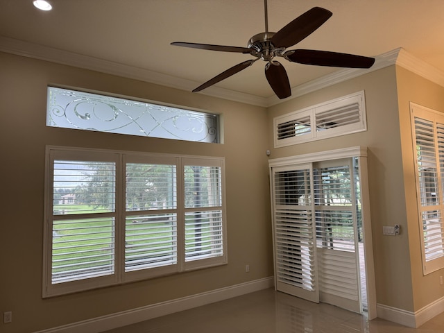 10469 Whitewind Cir, Boynton Beach, FL 33473 - empty room featuring crown molding, baseboards, a ceiling fan, and tile patterned floors