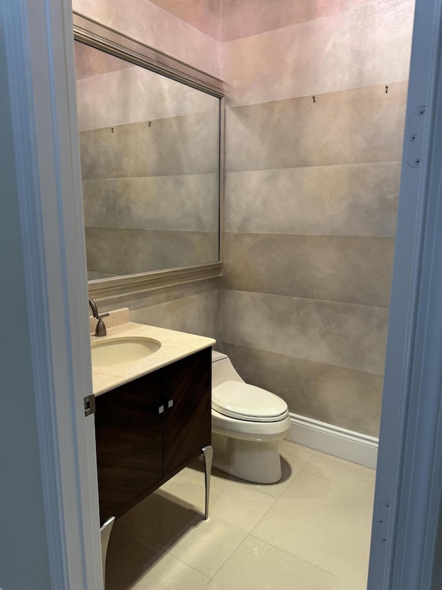 10469 Whitewind Cir, Boynton Beach, FL 33473 - bathroom featuring vanity, toilet, and tile patterned flooring