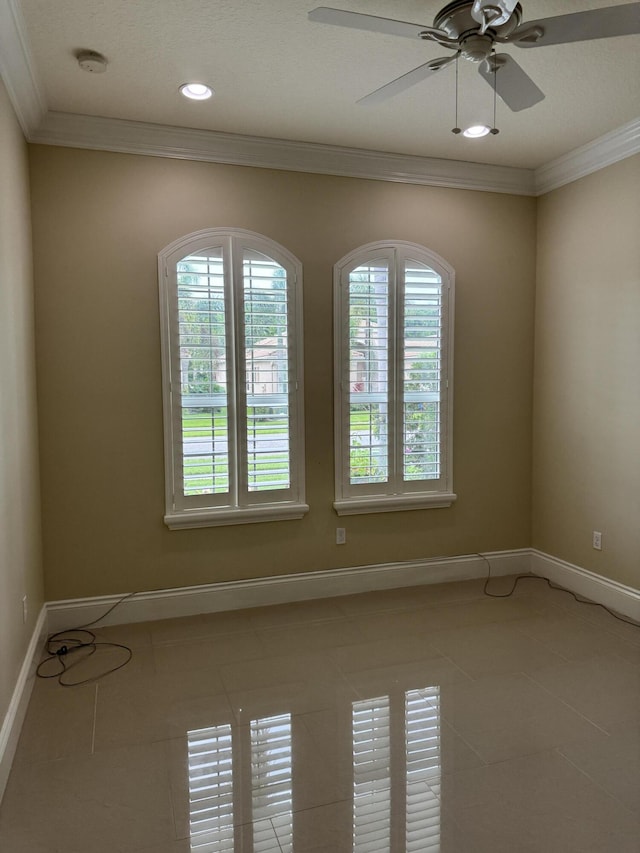 10469 Whitewind Cir, Boynton Beach, FL 33473 - tiled empty room featuring healthy amount of natural light, ornamental molding, ceiling fan, a smoke detector, and recessed lighting