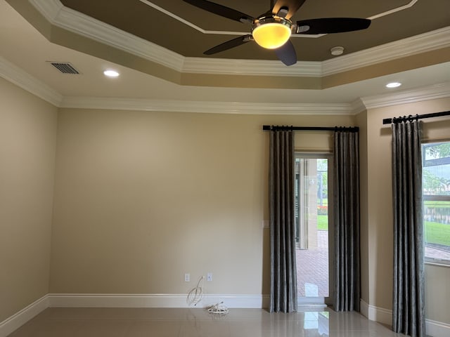 10469 Whitewind Cir, Boynton Beach, FL 33473 - unfurnished room with a ceiling fan, baseboards, ornamental molding, a smoke detector, and a tray ceiling
