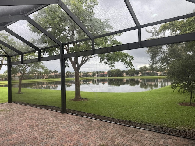 10469 Whitewind Cir, Boynton Beach, FL 33473 - unfurnished sunroom with a water view