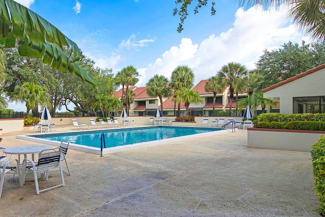 508 Sea Oats Dr Unit A-1, Juno Beach, FL 33408 - community pool with a patio
