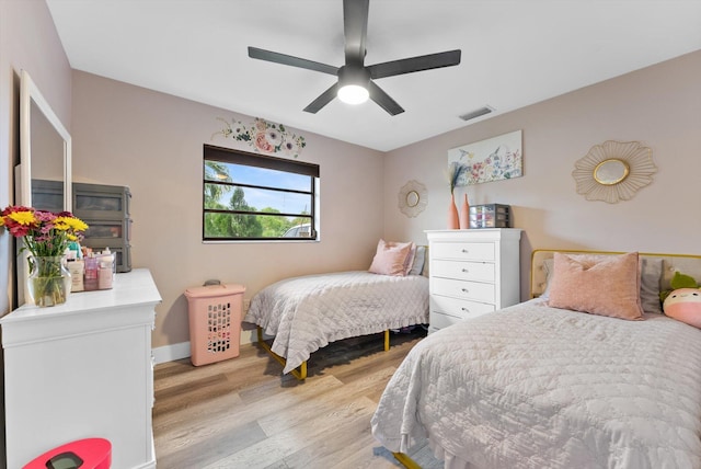 4501 N Australian Ave, West Palm Beach, FL 33407 - bedroom featuring light wood-type flooring, ceiling fan, and baseboards