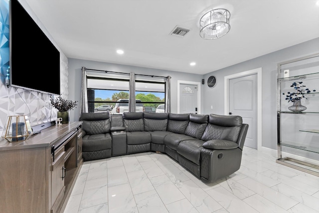 4501 N Australian Ave, West Palm Beach, FL 33407 - living area featuring light marble finish floors, recessed lighting, and baseboards