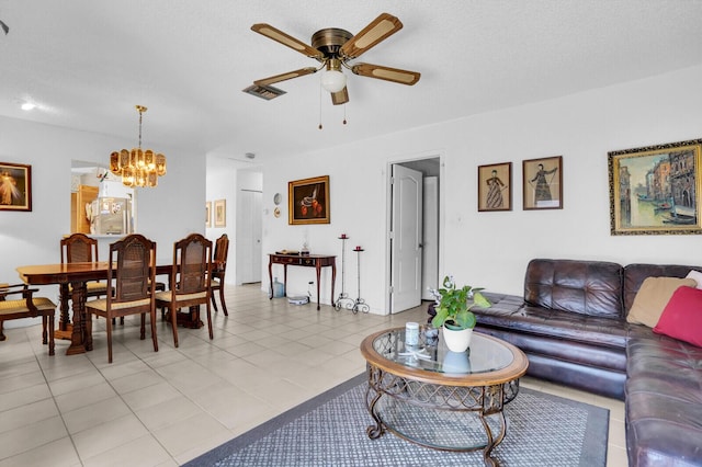 14775 Wildflower Ln, Delray Beach, FL 33446 - living room with ceiling fan, a chandelier, and light tile patterned floors