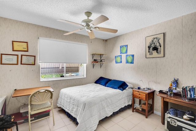 14775 Wildflower Ln, Delray Beach, FL 33446 - bedroom with tile patterned floors, a textured ceiling, and ceiling fan