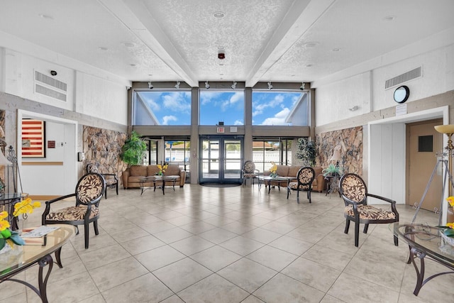 14775 Wildflower Ln, Delray Beach, FL 33446 - community lobby with a towering ceiling, beam ceiling, and a textured ceiling