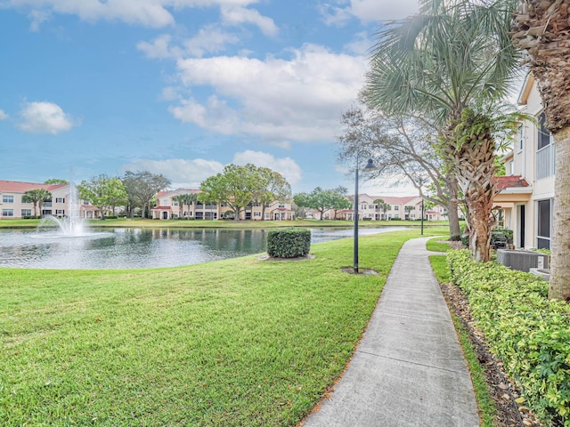 2536 57th Cir, Vero Beach, FL 32966 - view of property's community with a water view, a residential view, and a lawn